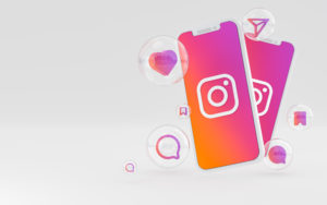 Dois celulares com Instagram aberto com ícones do app em sua volta
